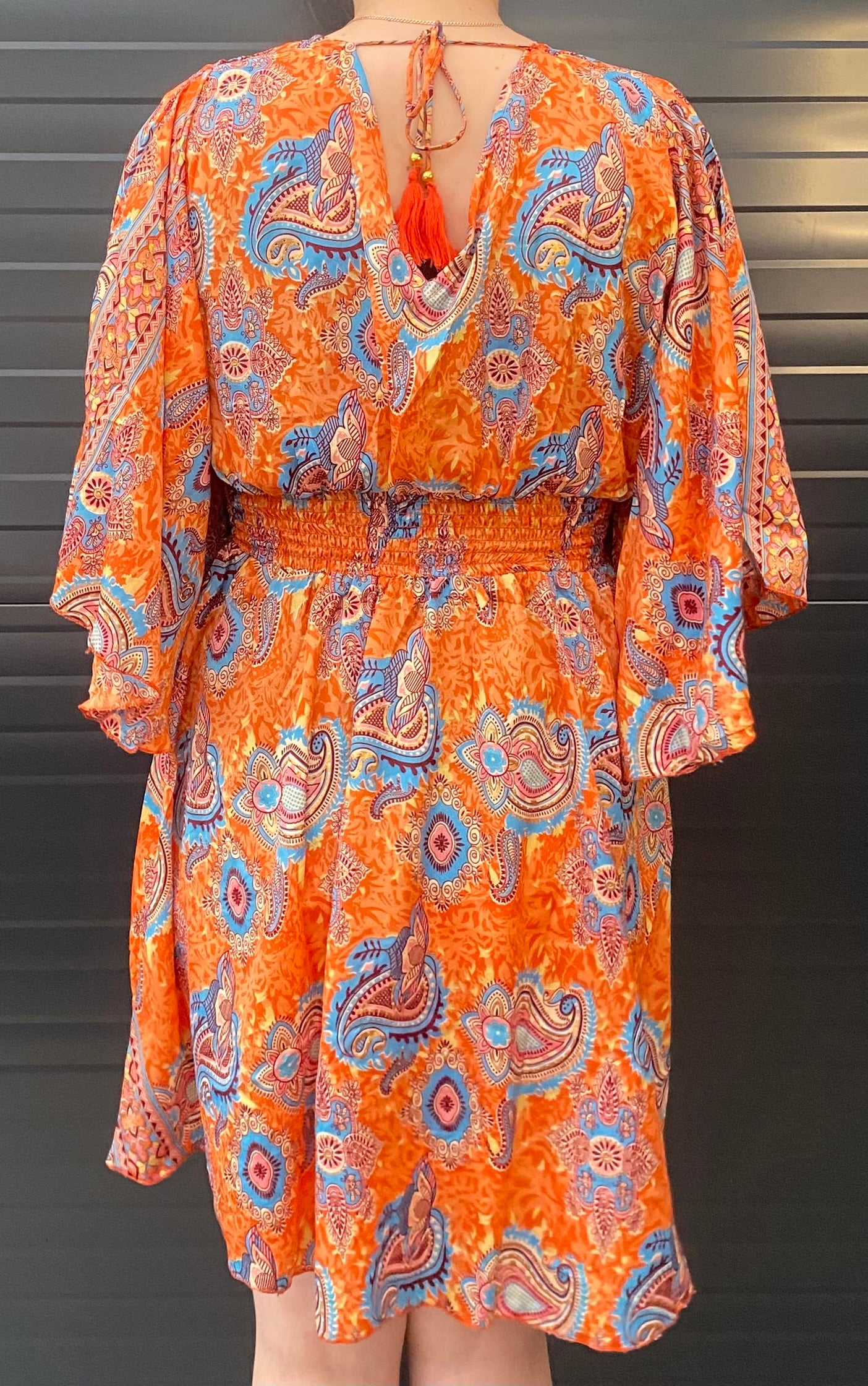 ibiza jurk oranje blauw klosjes